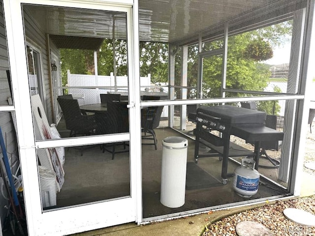 63 Rock Dove Ln, Camdenton, MO 65020 - view of patio / terrace featuring a sunroom