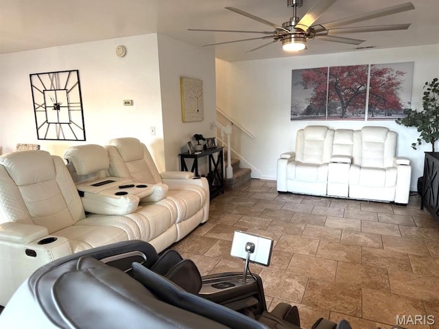 63 Rock Dove Ln, Camdenton, MO 65020 - living area featuring a ceiling fan, stairway, and stone finish flooring
