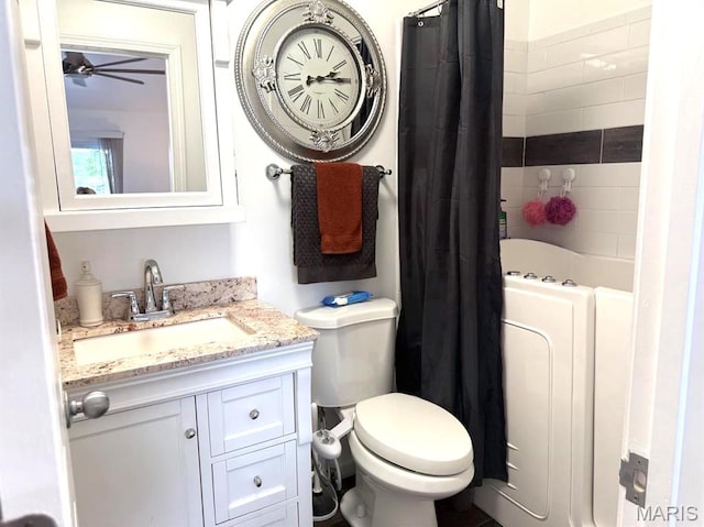 63 Rock Dove Ln, Camdenton, MO 65020 - bathroom with vanity, ceiling fan, and toilet
