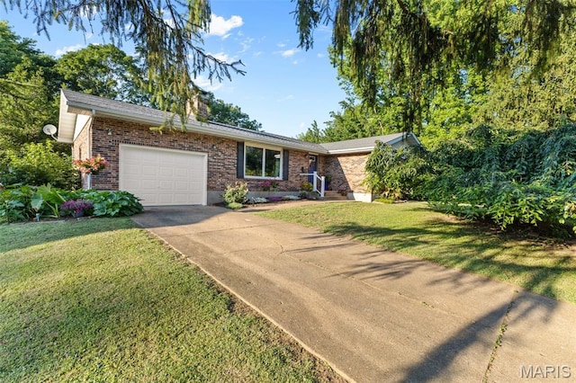 611 Park St, Farmington, MO 63640 - single story home with a garage, concrete driveway, brick siding, and a front lawn