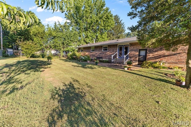 611 Park St, Farmington, MO 63640 - view of yard featuring entry steps and a patio area