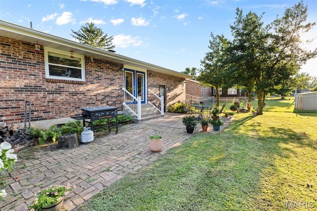 611 Park St, Farmington, MO 63640 - view of yard featuring a patio area and entry steps