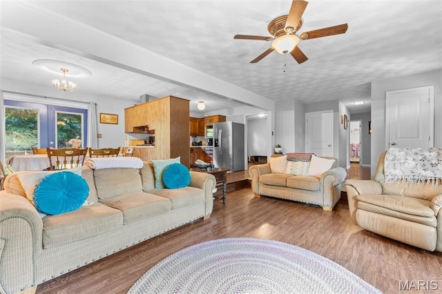 611 Park St, Farmington, MO 63640 - living room with ceiling fan, wood finished floors, and a chandelier