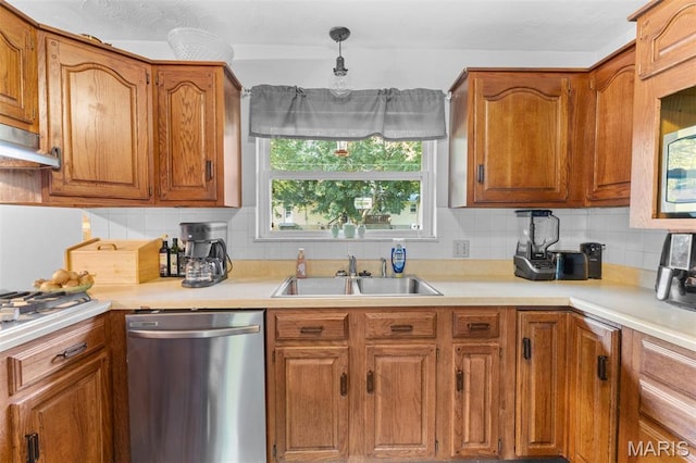 611 Park St, Farmington, MO 63640 - kitchen featuring stainless steel appliances, brown cabinetry, tasteful backsplash, light countertops, and ventilation hood