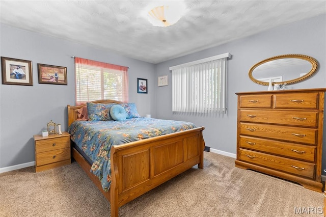 611 Park St, Farmington, MO 63640 - carpeted bedroom featuring baseboards