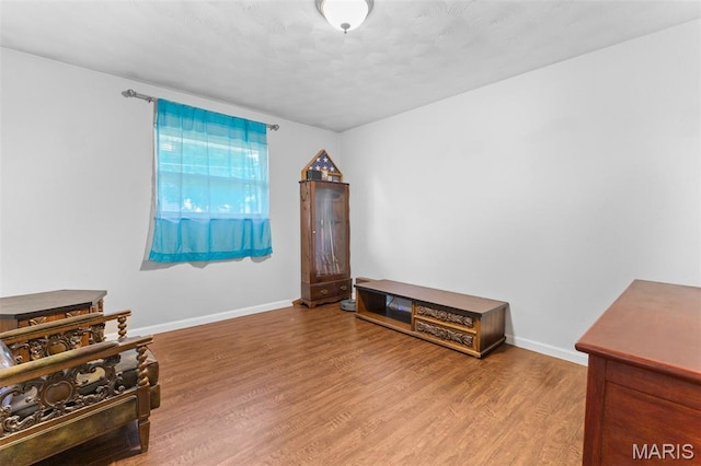 611 Park St, Farmington, MO 63640 - sitting room featuring wood finished floors and baseboards