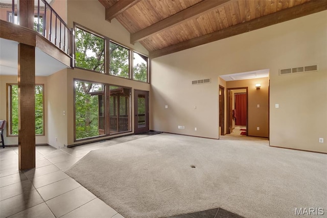 1509 Redbriar Dr, High Ridge, MO 63049 - unfurnished living room with a wooden ceiling with exposed beams, high vaulted ceiling, and tile patterned floors