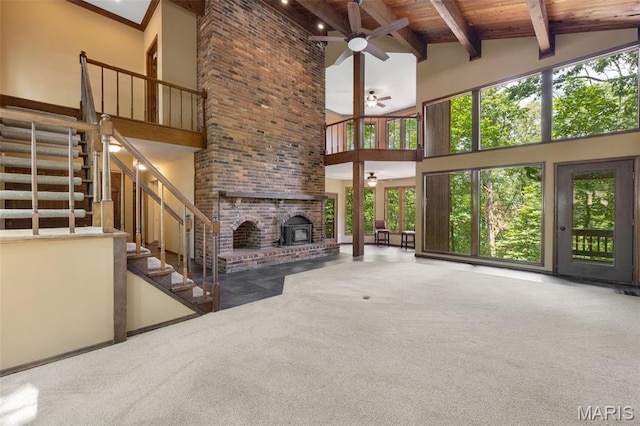 1509 Redbriar Dr, High Ridge, MO 63049 - unfurnished living room with carpet flooring, stairs, high vaulted ceiling, a wood ceiling with exposed beams, and ceiling fan