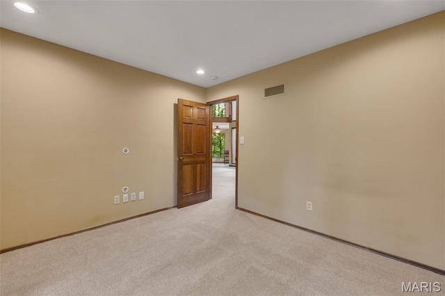 1509 Redbriar Dr, High Ridge, MO 63049 - empty room with recessed lighting and light carpet