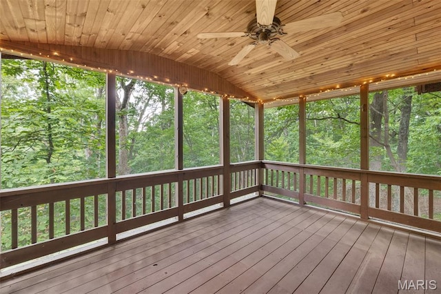 1509 Redbriar Dr, High Ridge, MO 63049 - unfurnished sunroom with ceiling fan, lofted ceiling, and a forest view