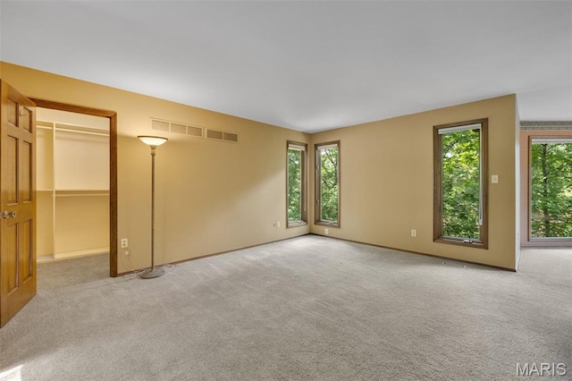 1509 Redbriar Dr, High Ridge, MO 63049 - carpeted empty room featuring baseboards