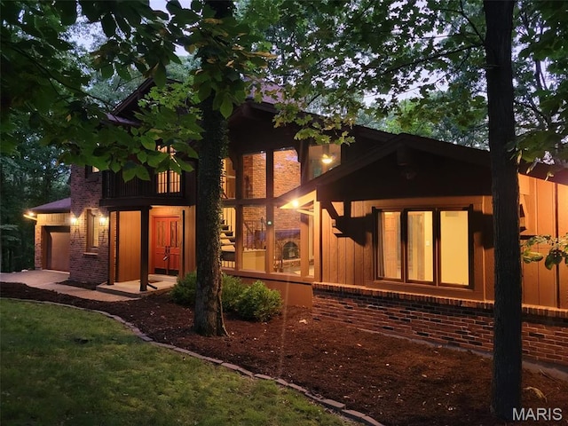 1509 Redbriar Dr, High Ridge, MO 63049 - view of front facade featuring brick siding
