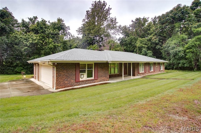 10000 Wondell Woods Dr, Belleville, IL 62223 - ranch-style home with a garage, brick siding, a front yard, and driveway