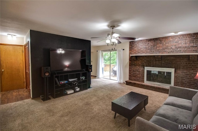 10000 Wondell Woods Dr, Belleville, IL 62223 - living room with ceiling fan, carpet floors, and a brick fireplace