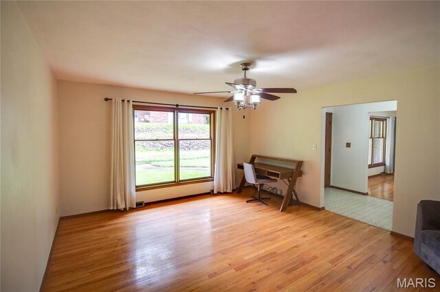 10000 Wondell Woods Dr, Belleville, IL 62223 - unfurnished room with light wood finished floors and a ceiling fan