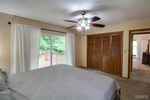10000 Wondell Woods Dr, Belleville, IL 62223 - carpeted bedroom with access to exterior, a closet, and ceiling fan