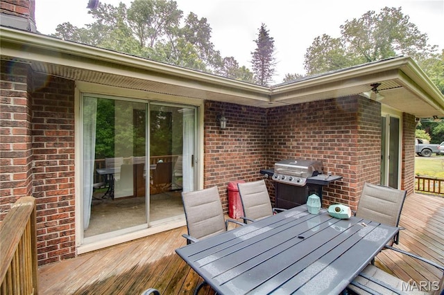 10000 Wondell Woods Dr, Belleville, IL 62223 - wooden terrace featuring outdoor dining space and a grill