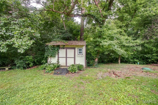 10000 Wondell Woods Dr, Belleville, IL 62223 - view of green lawn with a storage shed