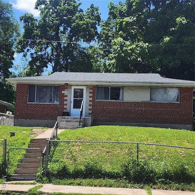 5344 Northland Ave, Saint Louis, MO 63112 - view of front of property featuring brick siding, a gate, and entry steps