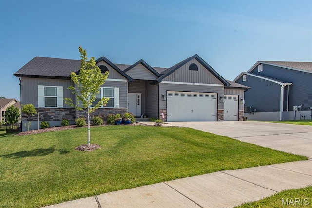 509 Spruce Hollow Ct, Wentzville, MO 63385 - craftsman house featuring board and batten siding, stone siding, a garage, concrete driveway, and a front lawn