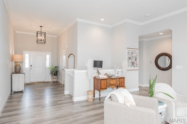 509 Spruce Hollow Ct, Wentzville, MO 63385 - foyer with light wood finished floors, a chandelier, crown molding, and recessed lighting