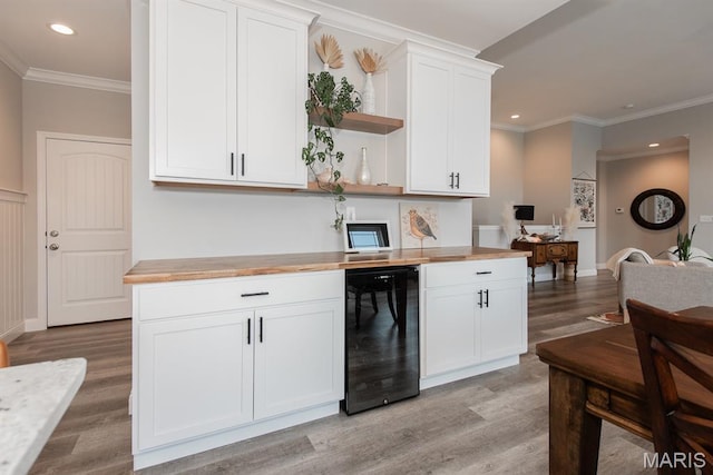 509 Spruce Hollow Ct, Wentzville, MO 63385 - kitchen featuring wine cooler, open shelves, butcher block countertops, light wood-type flooring, and recessed lighting