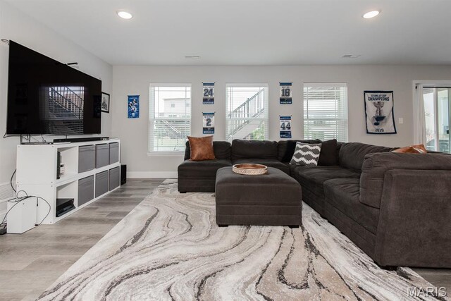 509 Spruce Hollow Ct, Wentzville, MO 63385 - living area featuring light wood-type flooring, plenty of natural light, and recessed lighting
