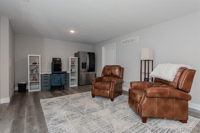 509 Spruce Hollow Ct, Wentzville, MO 63385 - living area featuring wood finished floors and recessed lighting