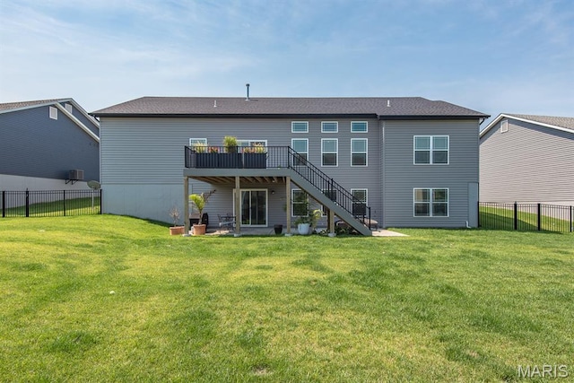 509 Spruce Hollow Ct, Wentzville, MO 63385 - back of property featuring stairway, a deck, and a fenced backyard