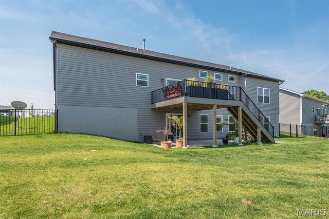 509 Spruce Hollow Ct, Wentzville, MO 63385 - back of house featuring a wooden deck and stairway