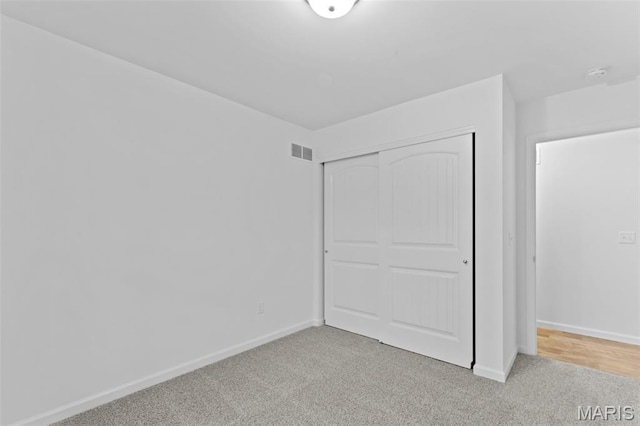 104 Tick Rd, Silex, MO 63377 - unfurnished bedroom with light colored carpet and a closet