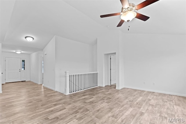104 Tick Rd, Silex, MO 63377 - spare room with vaulted ceiling, light wood-type flooring, and a ceiling fan