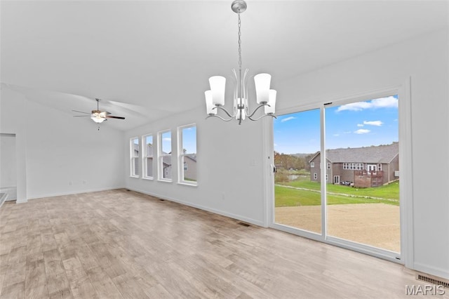 104 Tick Rd, Silex, MO 63377 - unfurnished dining area with a chandelier, plenty of natural light, light wood-style floors, a ceiling fan, and vaulted ceiling