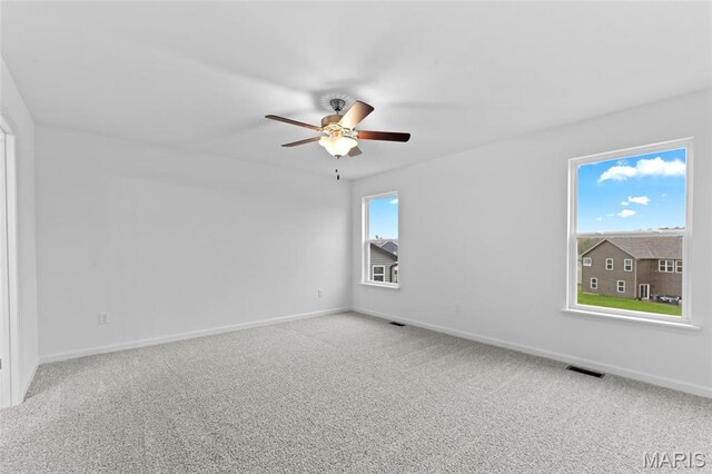 104 Tick Rd, Silex, MO 63377 - empty room with a ceiling fan and carpet flooring