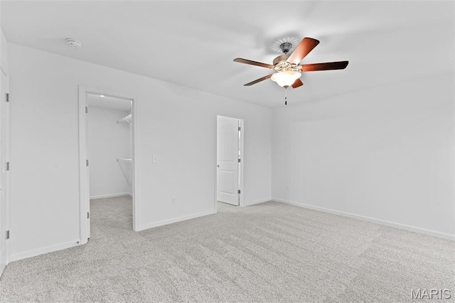104 Tick Rd, Silex, MO 63377 - carpeted spare room with ceiling fan and a smoke detector