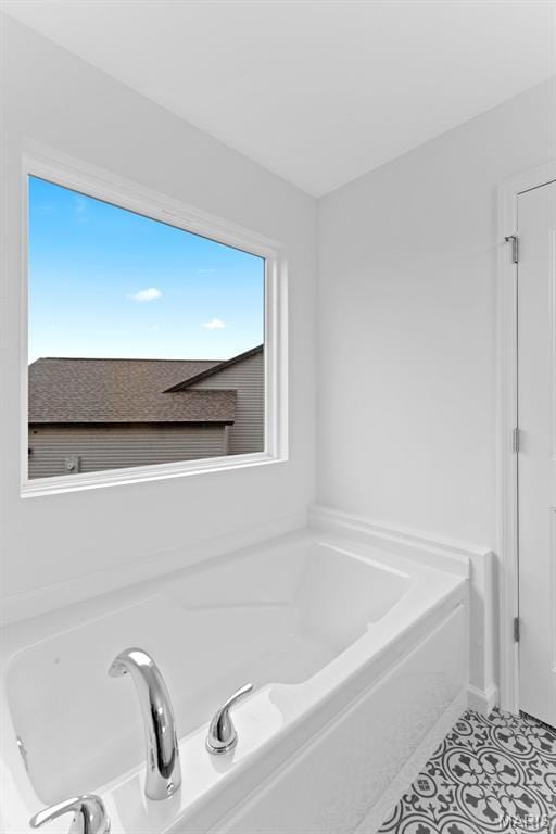 104 Tick Rd, Silex, MO 63377 - full bathroom featuring a garden tub and tile patterned floors