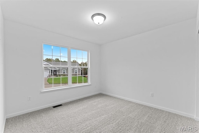 104 Tick Rd, Silex, MO 63377 - empty room with carpet flooring and baseboards