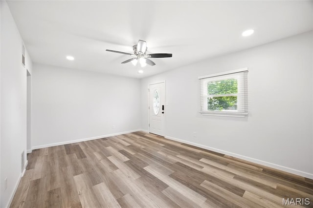 7825 Delmont St, Saint Louis, MO 63123 - empty room featuring ceiling fan, wood finished floors, recessed lighting, and baseboards