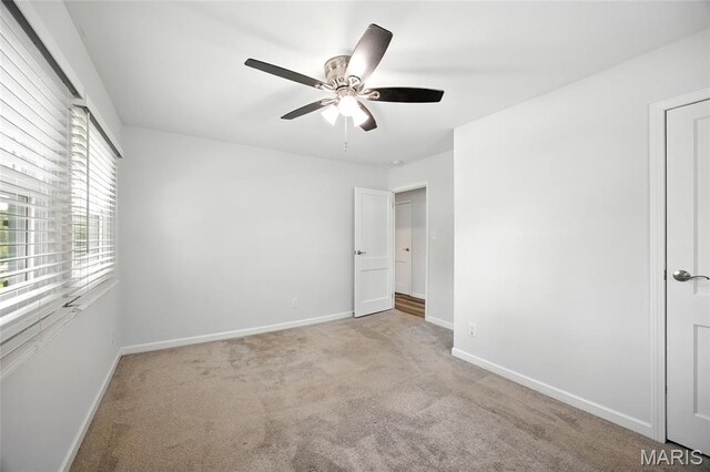 7825 Delmont St, Saint Louis, MO 63123 - unfurnished bedroom featuring carpet flooring, baseboards, and ceiling fan