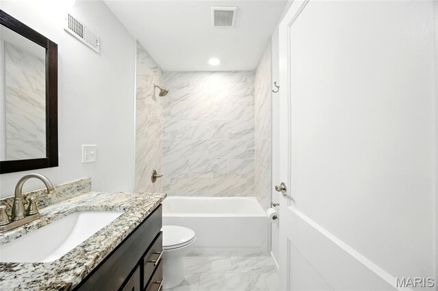 7825 Delmont St, Saint Louis, MO 63123 - full bath featuring marble look tiles, vanity, toilet, shower / washtub combination, and recessed lighting