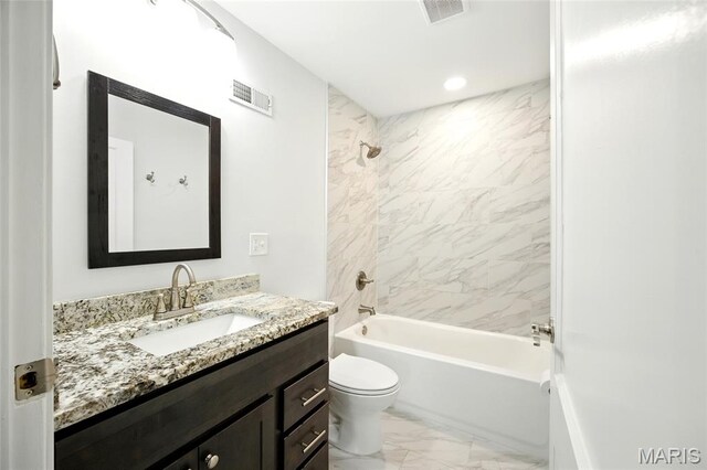 7825 Delmont St, Saint Louis, MO 63123 - bathroom with marble look tile flooring, vanity, toilet, bathing tub / shower combination, and recessed lighting