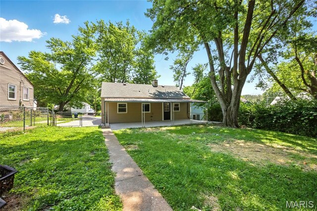 7825 Delmont St, Saint Louis, MO 63123 - rear view of property featuring a patio and a gate