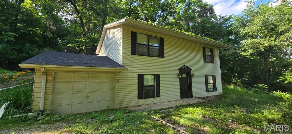 3307 Woodland Trl, Imperial, MO 63052 - colonial inspired home with an attached garage