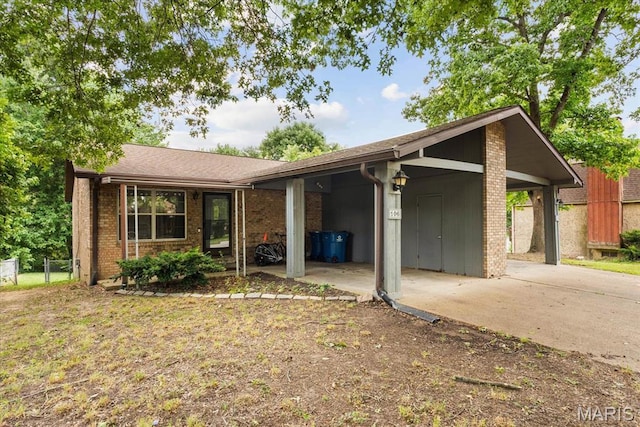 104 Britanna Dr, Swansea, IL 62226 - view of front of home featuring driveway, a carport, and brick siding