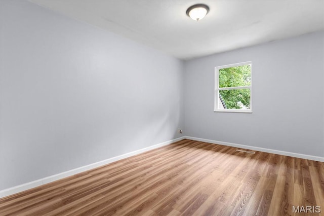 104 Britanna Dr, Swansea, IL 62226 - spare room with baseboards and wood finished floors