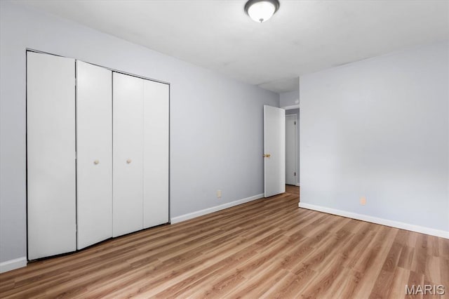 104 Britanna Dr, Swansea, IL 62226 - unfurnished bedroom with wood finished floors and a closet