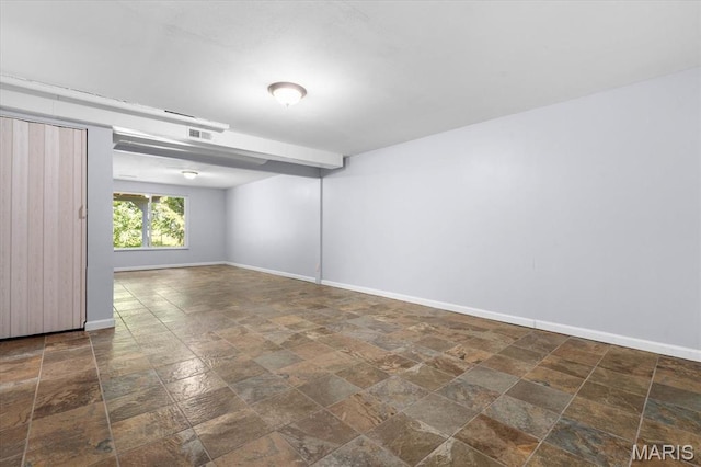 104 Britanna Dr, Swansea, IL 62226 - spare room with dark stone finish floors and baseboards
