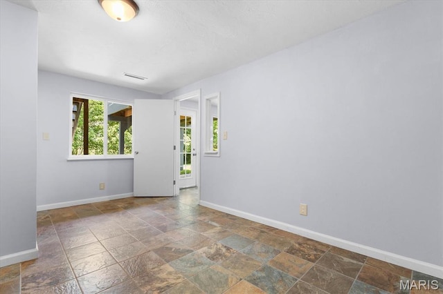 104 Britanna Dr, Swansea, IL 62226 - spare room with stone tile floors and baseboards