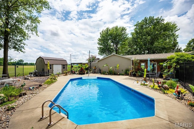 900 Montana St, Gillespie, IL 62033 - view of pool featuring a patio and a storage shed