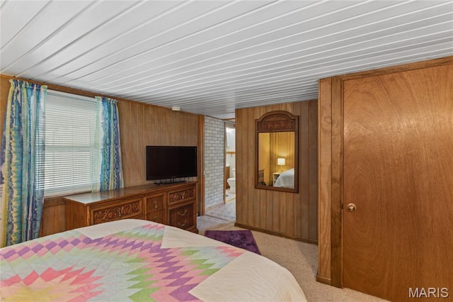 614 Main St, Keyesport, IL 62253 - bedroom with wooden walls and carpet flooring